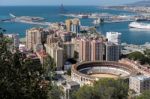 View Of The Harbour Area And Bullring In Malaga Stock Photo