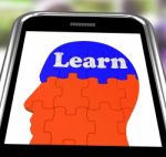 Learn On Brain On Smartphone Showing Human Training Stock Photo