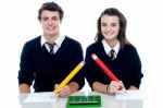 School Friends Writing On Pencil Stock Photo