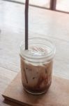 Iced Coffee On Wooden Table Stock Photo