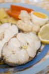 Hake Fish With Cauliflower And Potatoes Stock Photo