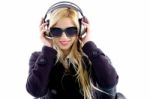 Young Lady Enjoying Music Stock Photo