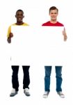 Standing Guys Holding Blank Board Stock Photo