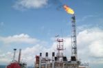 Gas Or Flare Burn On Offshore Platform Stock Photo