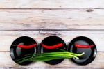 Vegetables In Plates Over Wooden Background Stock Photo