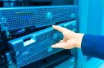 Man Fix Server Network In Data Center Room Stock Photo