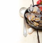 Fresh Clams On An Iron Skillet Stock Photo