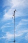 Old Television Antenna Against Blue Colorful Sky Stock Photo