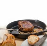 Pork Chop Seared On Iron Skillet Stock Photo