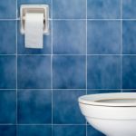 White Sanitary Ware And Tissues Stock Photo