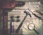 Set Of Tools Over A Wood Background Stock Photo