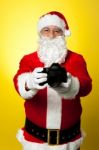 Santa Claus Holding Up His Brand New Dslr Stock Photo