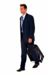 Businessman With Travel Bag Stock Photo