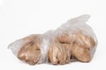 View Of Some Ginger Roots Inside A Plastic Bag Stock Photo