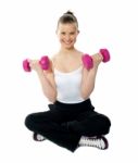 Young Girl Lifting Weights Stock Photo