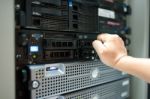 Man Fix Server Network In Data Center Room Stock Photo