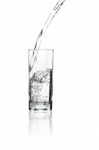 Water Flowing Into A Tall Glass With Its Reflection Isolated On Stock Photo