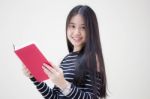 Portrait Of Thai Teen Beautiful Girl Reading Book Stock Photo