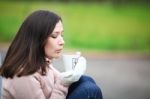 Dreaming Girl With Cup Of Coffee Stock Photo