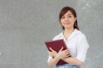 Portrait Of Thai Adult Businesswoman Beautiful Girl Read A Book Stock Photo