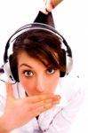 Front Pose Of Amazed Woman Listening Music Stock Photo