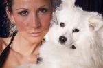 Portrait Of Young Pretty Widow Woman In Black And White Dog Stock Photo