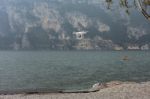 Drone Hovering On The Shoreline At Riva Del Garda Stock Photo