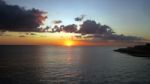 Sunrise In A Mediterranean Island Malta With A Cloudy Sky In Summer Stock Photo