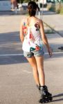 Young Woman With Roller Skate Riding In The Park Stock Photo