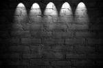 Spotlight On The Brick Wall Stock Photo