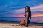 Beautiful Black African American Woman Posing On The Beach At Su Stock Photo