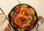 Roasted Shrimps With Zucchini And Tomatoes Stock Photo