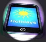 Holidays On Phone Displays Vacation Leave Or Break Stock Photo