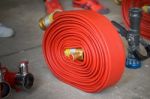 Red Hose Fire Stock Photo