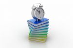 Alarm Clock On Books Stock Photo