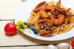 Italian Seafood Spaghetti Pasta On Red Tomato Sauce Stock Photo