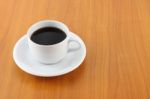 Cup Of Coffee On Wooden Table Stock Photo