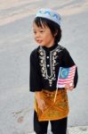 Young Boy Holding Flag Stock Photo