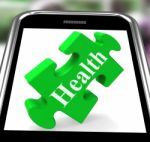 Health Smartphone Shows Wellness And Fitness On Web Stock Photo