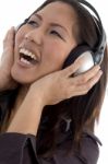 Female Enjoying Headphone Stock Photo