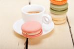 Colorful Macaroons With Espresso Coffee Stock Photo