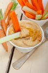 Fresh Hummus Dip With Raw Carrot And Celery Stock Photo