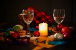 Two Glasses Of Champagne With A Christmas Decor In The Background Stock Photo