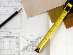 Pencil And Yellow Tape On Blueprint Stock Photo