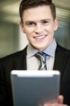 Smiling Businessman With Tablet Pc Stock Photo