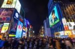 Tourist Walking In Night Shopping Street At Dotonbori In Osaka, Japan Stock Photo