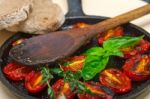 Baked Cherry Tomatoes With Basil And Thyme Stock Photo