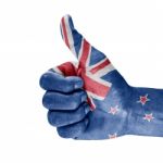 New Zealand Flag On Hand Stock Photo