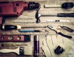 Set Of Tools Over A Wood Background Stock Photo