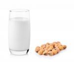 Fresh Milk In The Glass With Soy Beans On White Background Stock Photo